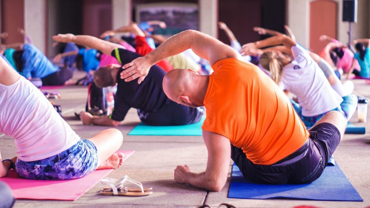 How To Navigate Fitness and Yoga Classes With Hearing Loss That Makes You Want To Return Again